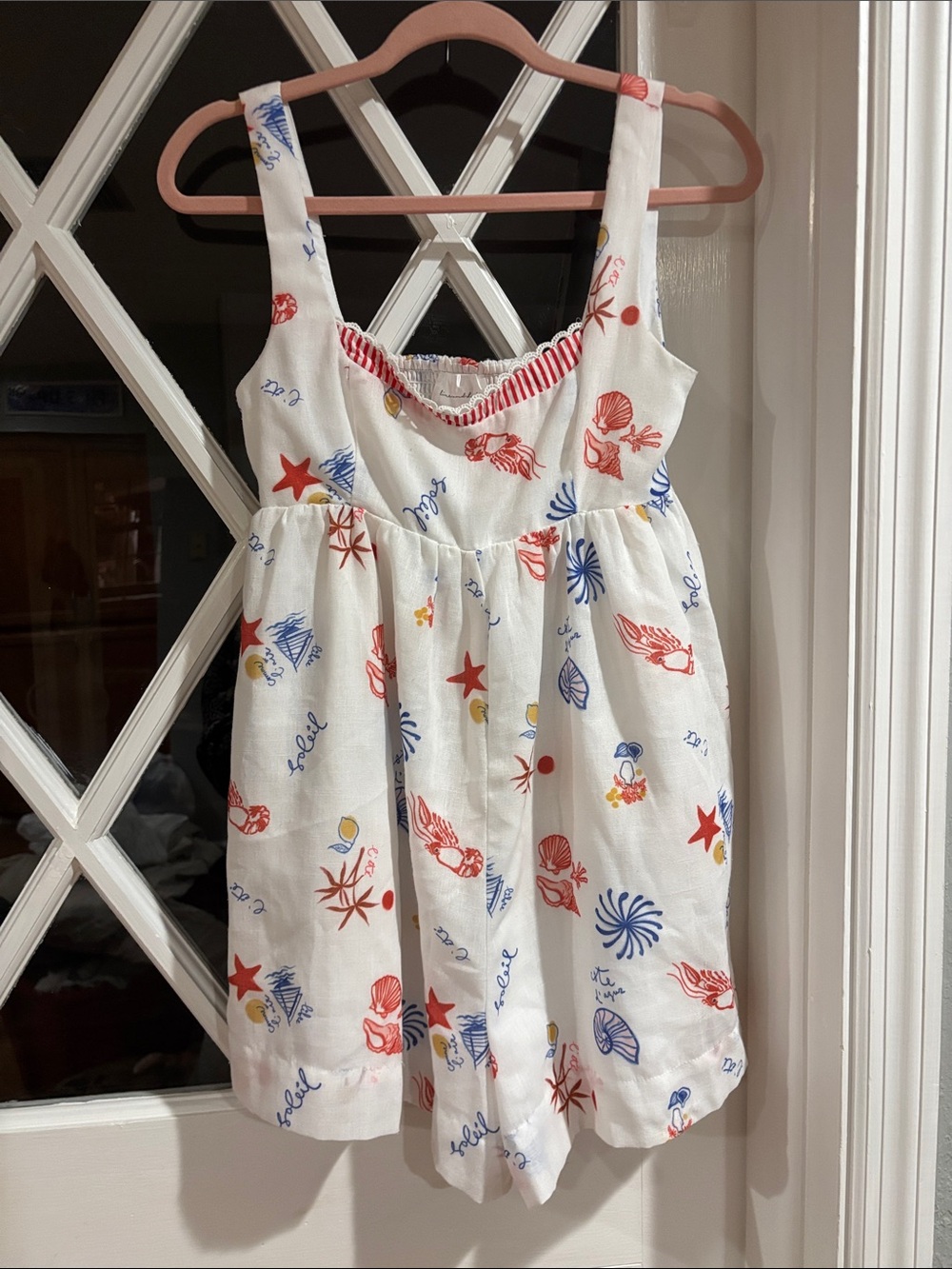 White Nautical Print Romper with Red & Blue Shell Motif